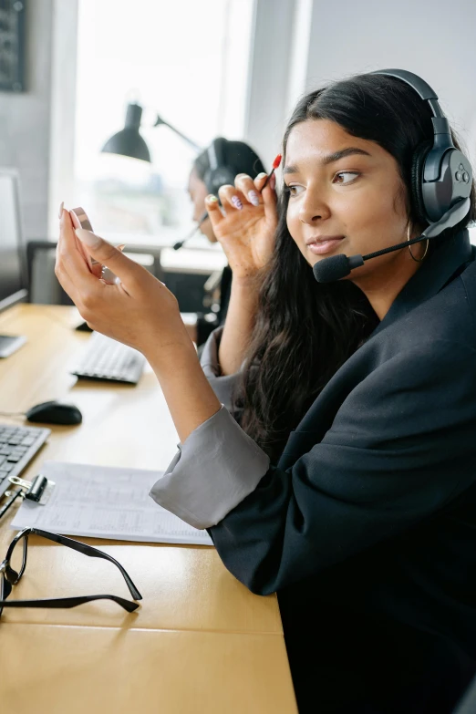 a female call center operator with headphones