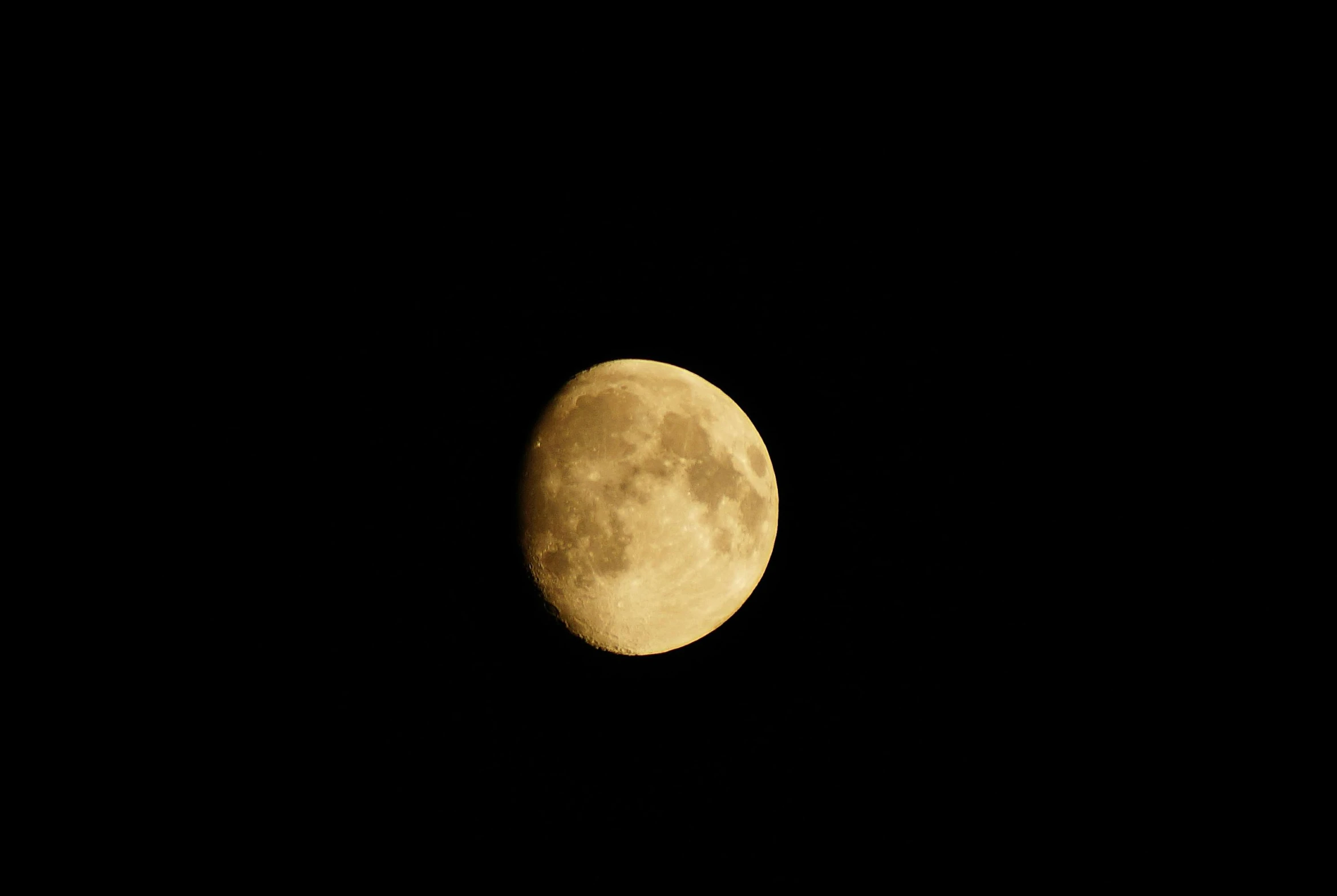 an image of a full moon taken from a plane