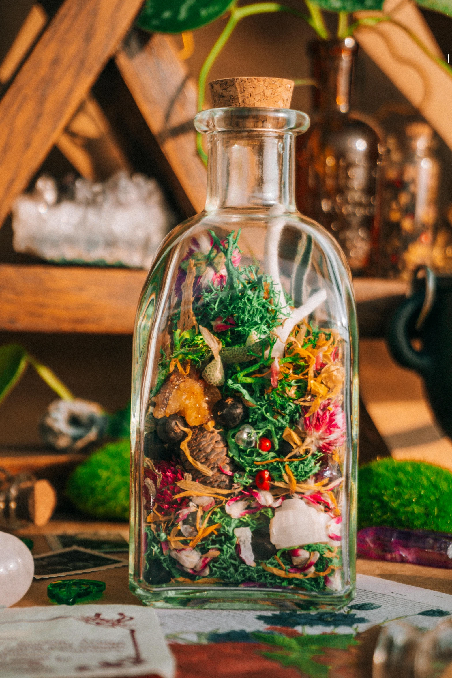 a glass vase with lots of different types of food inside of it