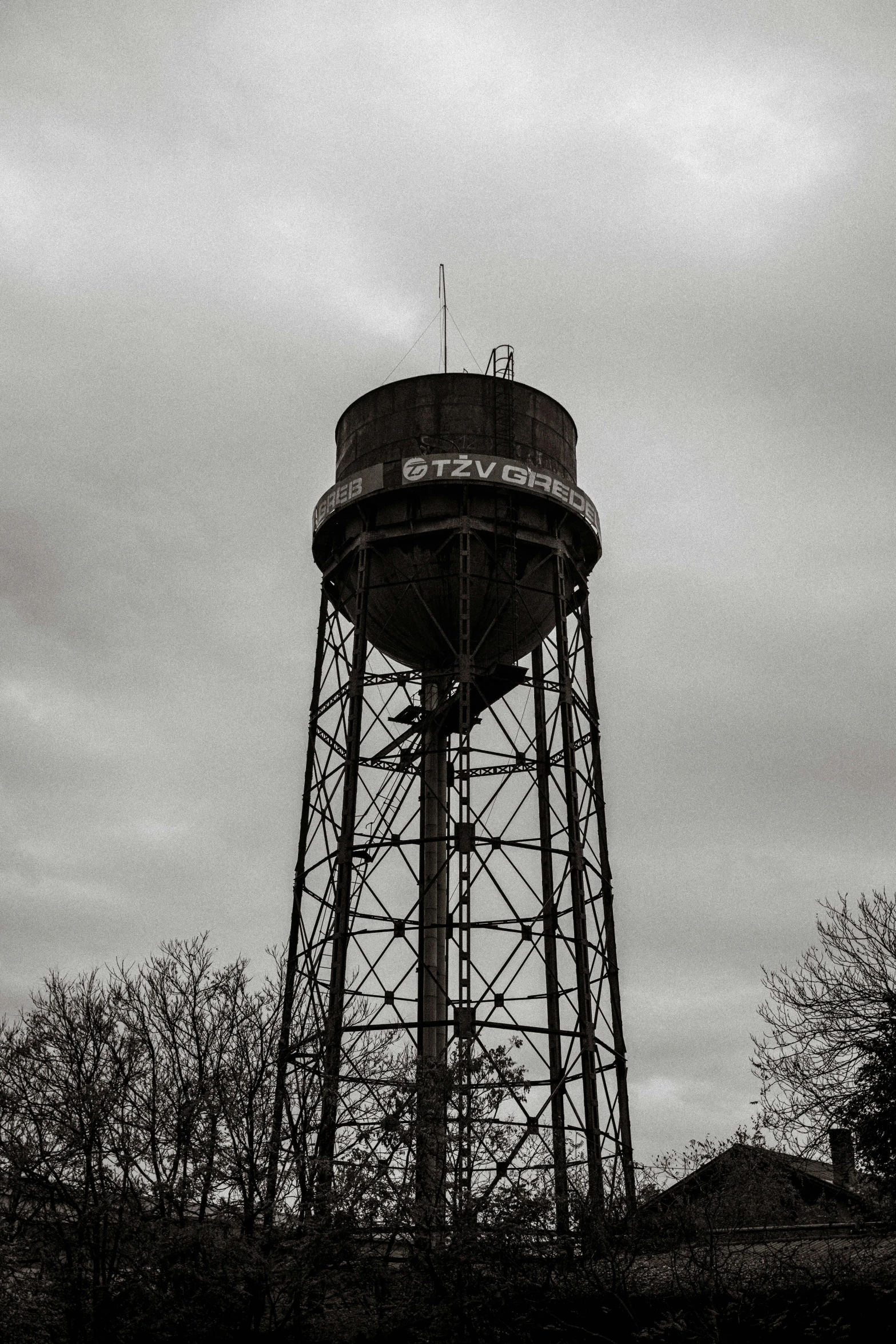 a black and white po of a tower with the word's on top