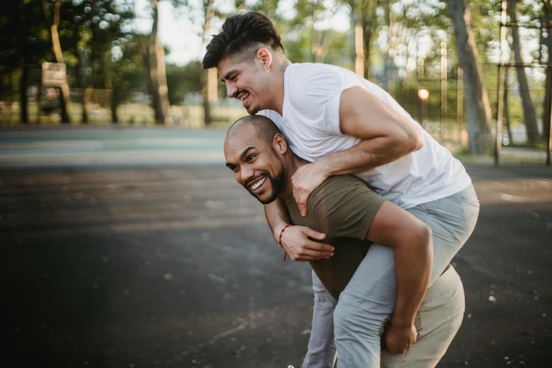 two people who are hugging each other