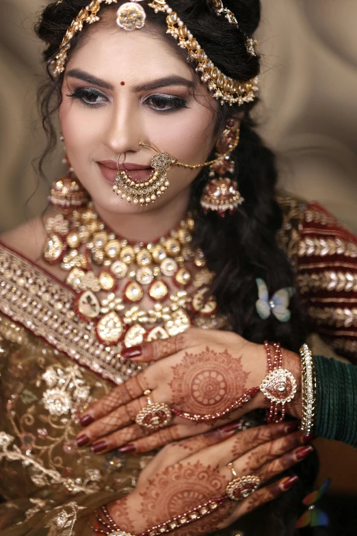 a bride is getting makeup done by the make - up artist