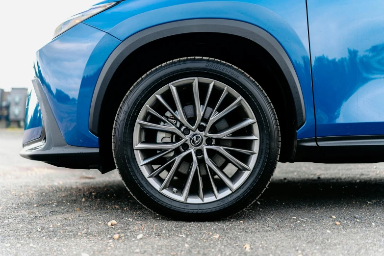 a close - up of the spokes on the new wheel, which gives the car an impressive visual visual space