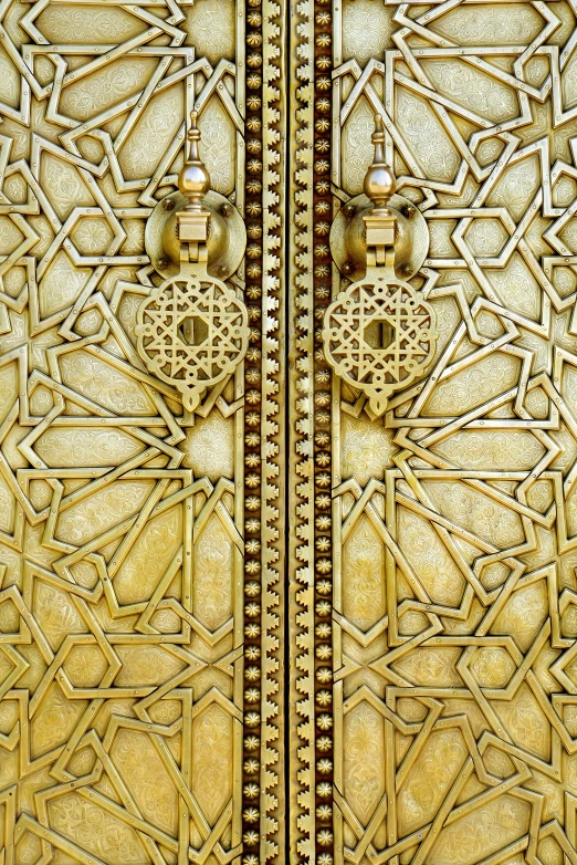 intricate gold ornate door on white background