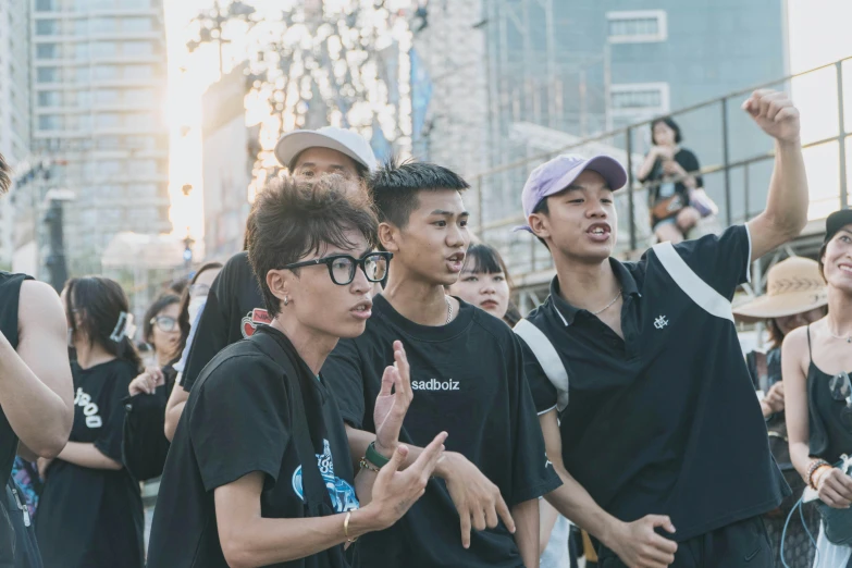 a group of young men standing next to each other