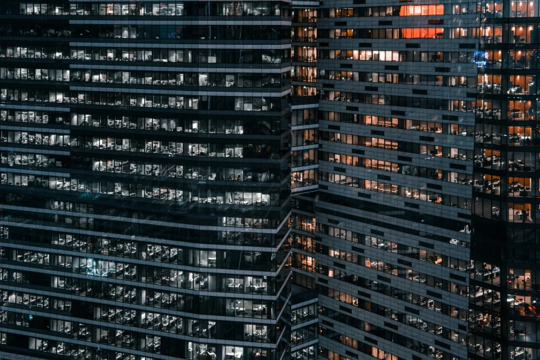 a large building at night with lots of windows