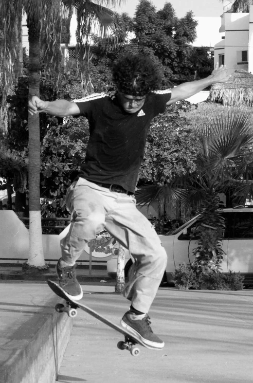 a man jumping in the air on a skateboard