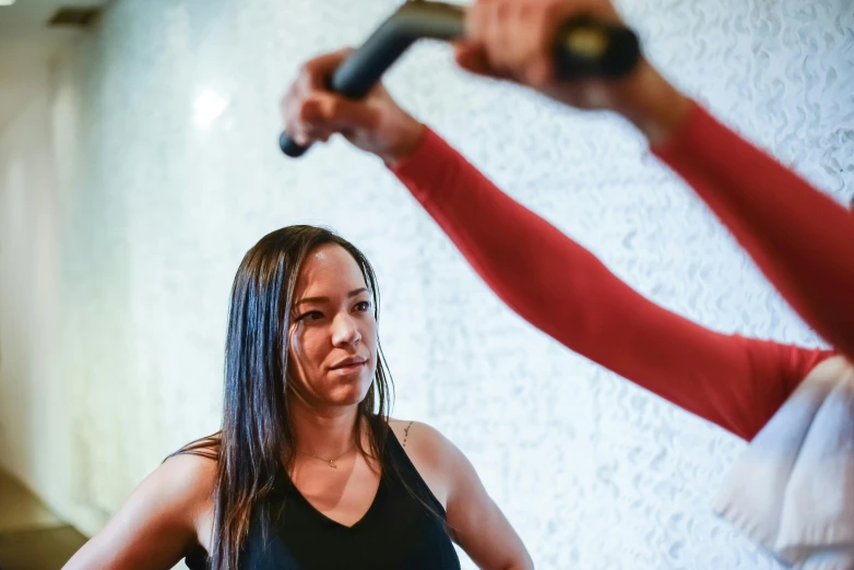 woman doing an intense dance pose with someone in front