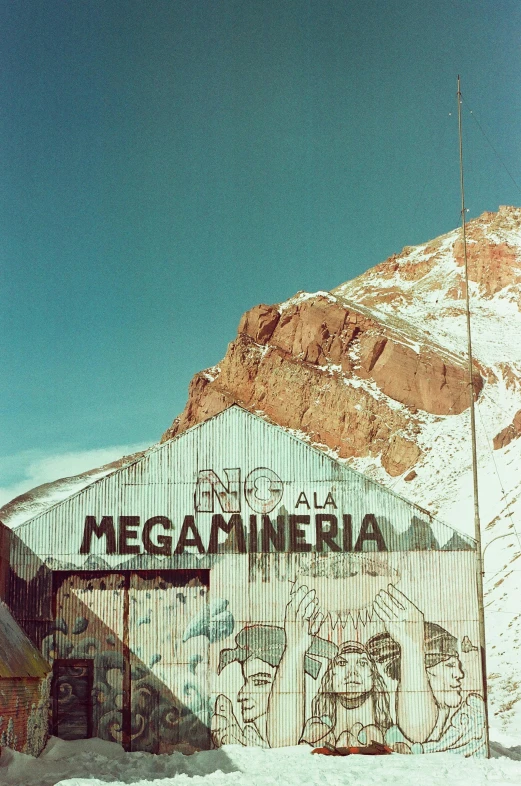 a building with a mural on it that reads megaannedia