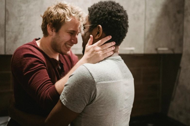 two men in a bathroom emcing each other