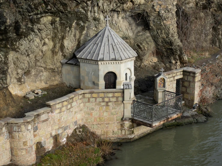 there is a very pretty old structure by the water