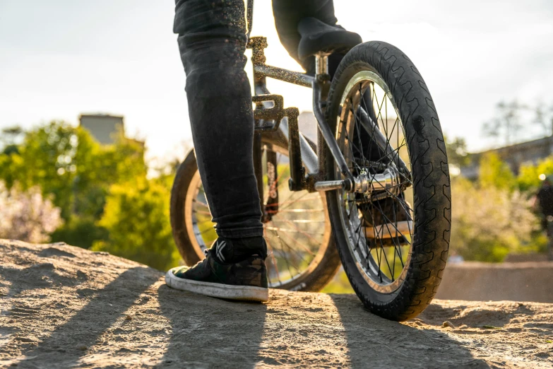 a man riding on the back of a bike