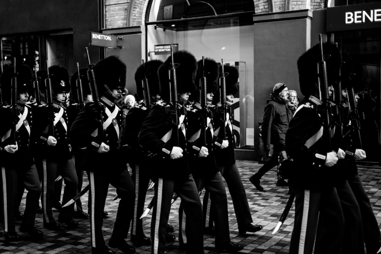 a group of men that are standing in front of each other