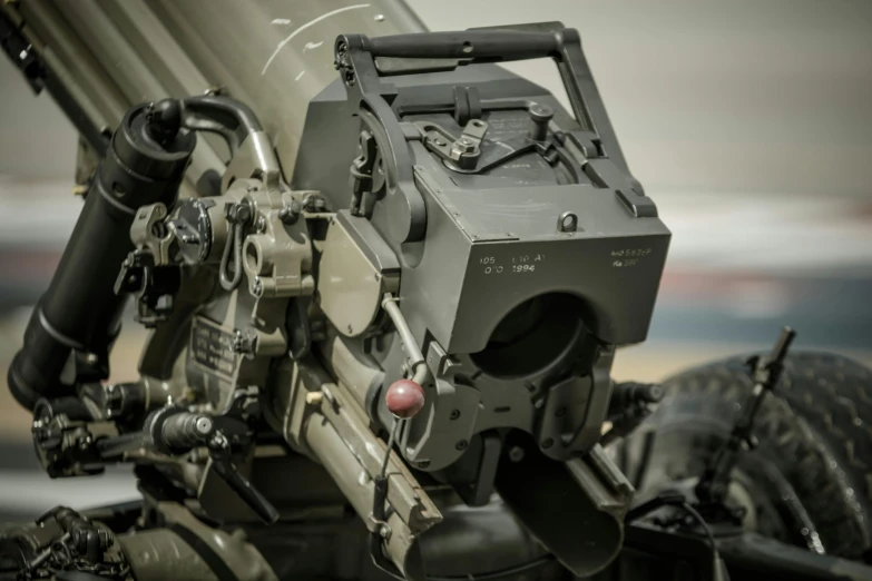 military equipment being displayed in large display room