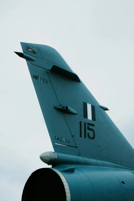 the side of an airplane that is very large and has it's tail end pointed up