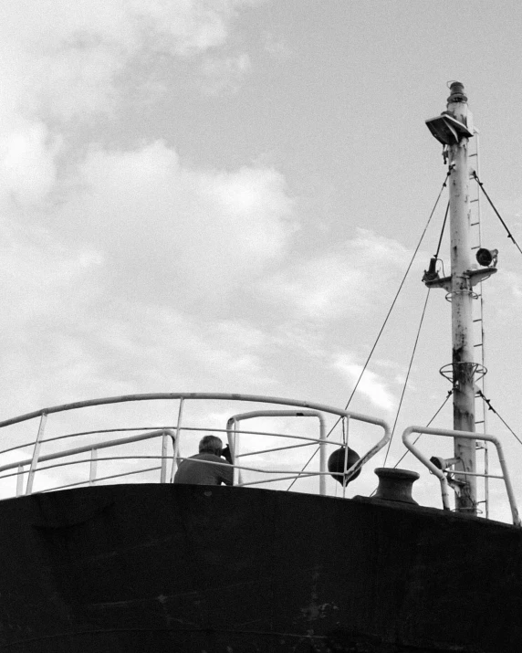 two people in the boat in the ocean