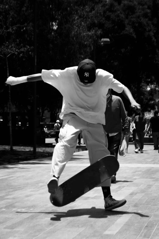 a man is doing tricks on his skateboard