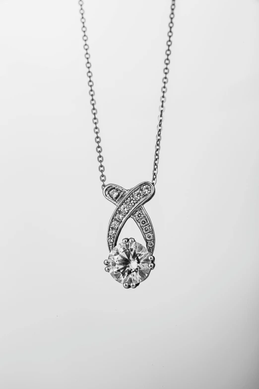 the necklace has been made with an oval shape with a clear center