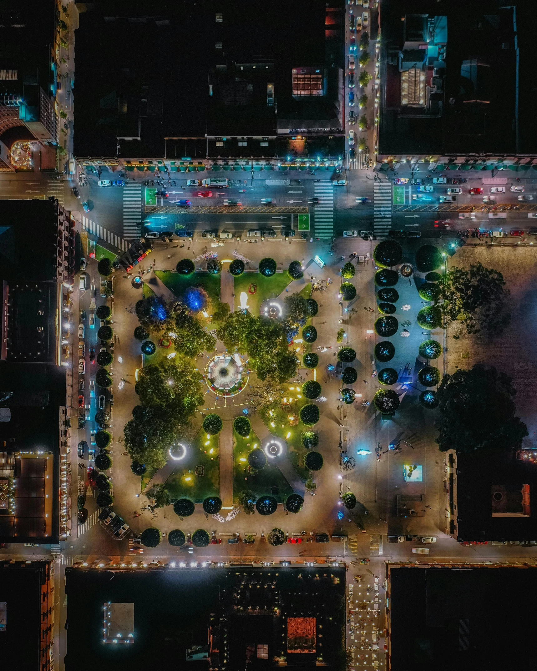 aerial view of street and buildings at night