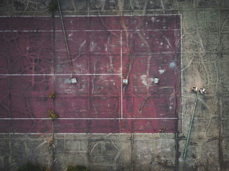 two tennis courts with several lines drawn on it