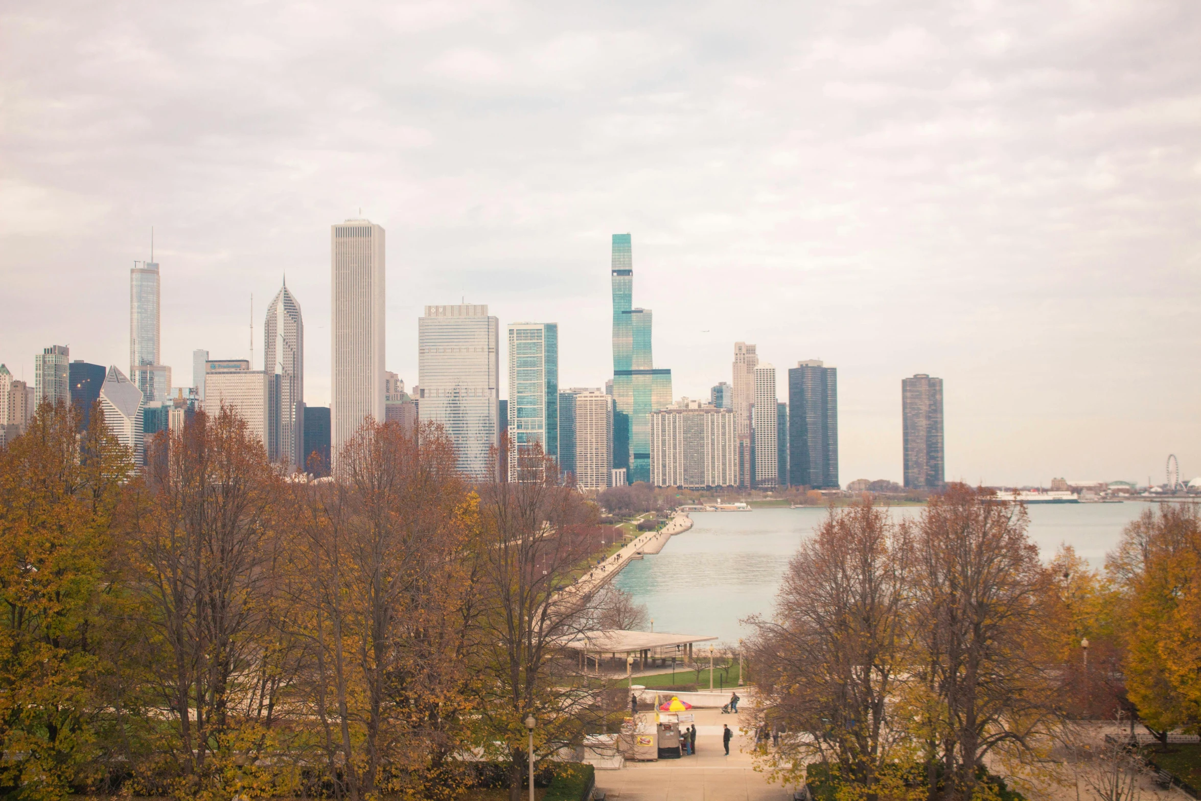 the city is in the distance of the water