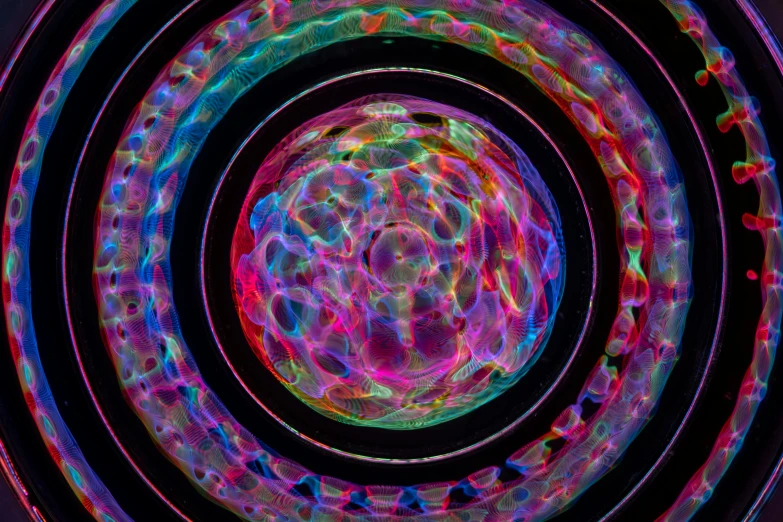 a digital po with bright colors in a circular design