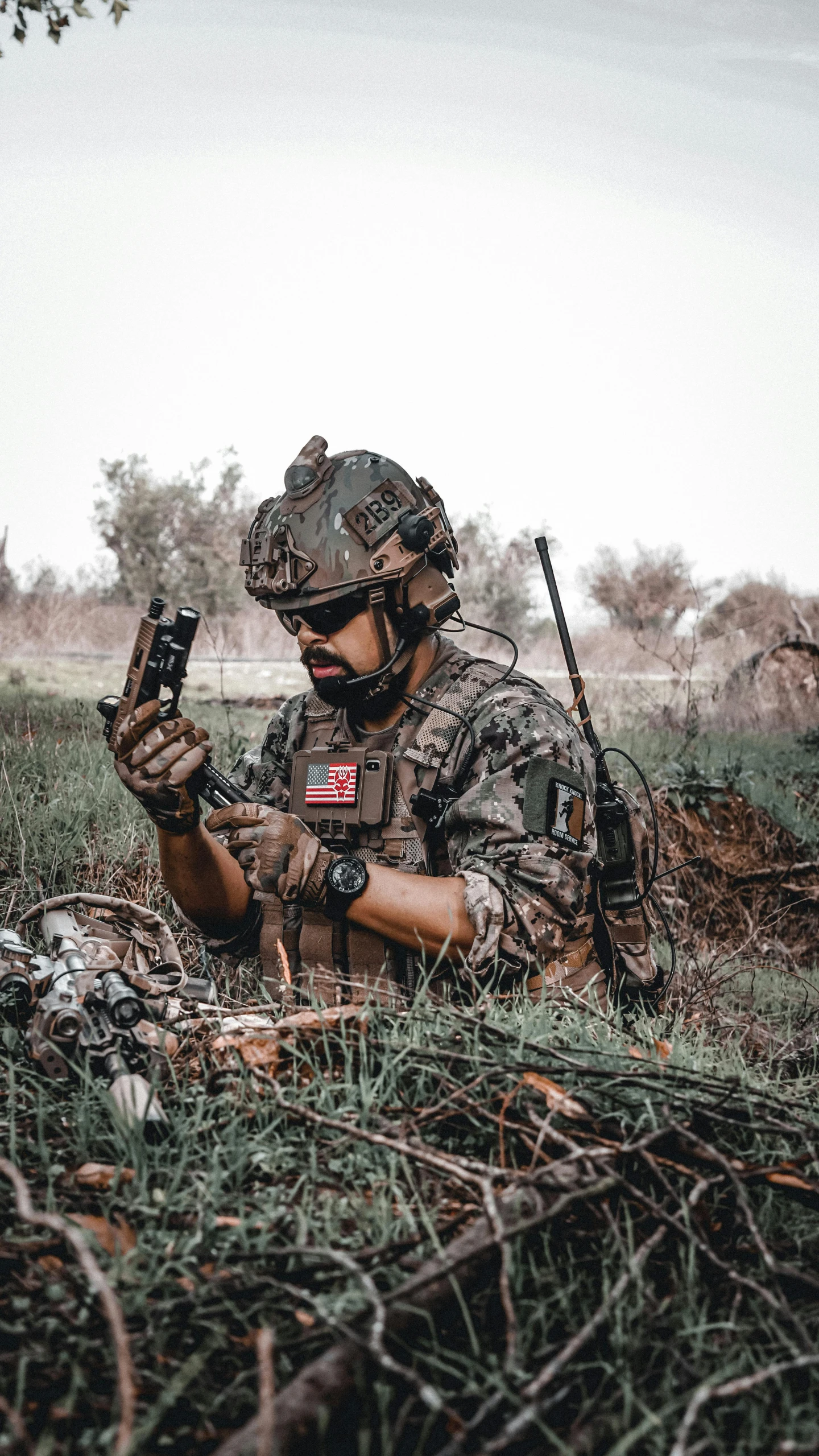 a soldier with a gun and a bottle of beer