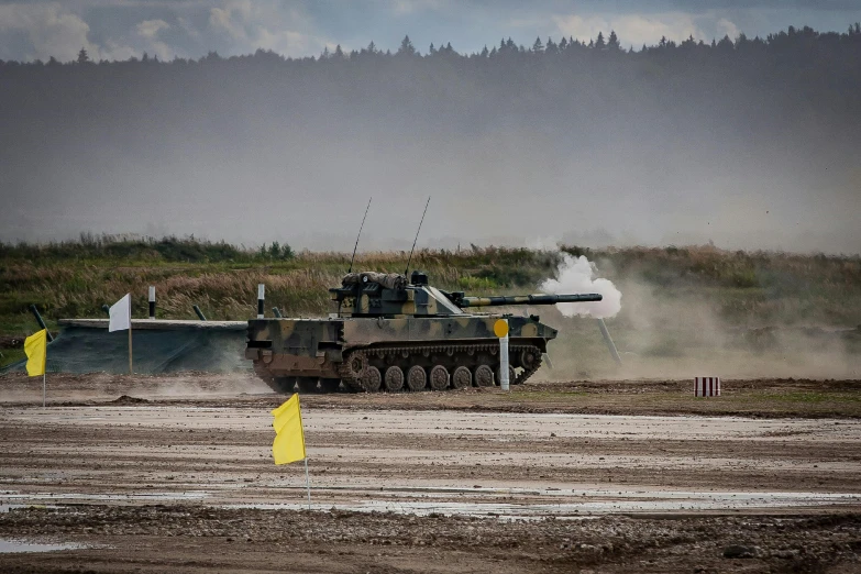 an army vehicle going down the road