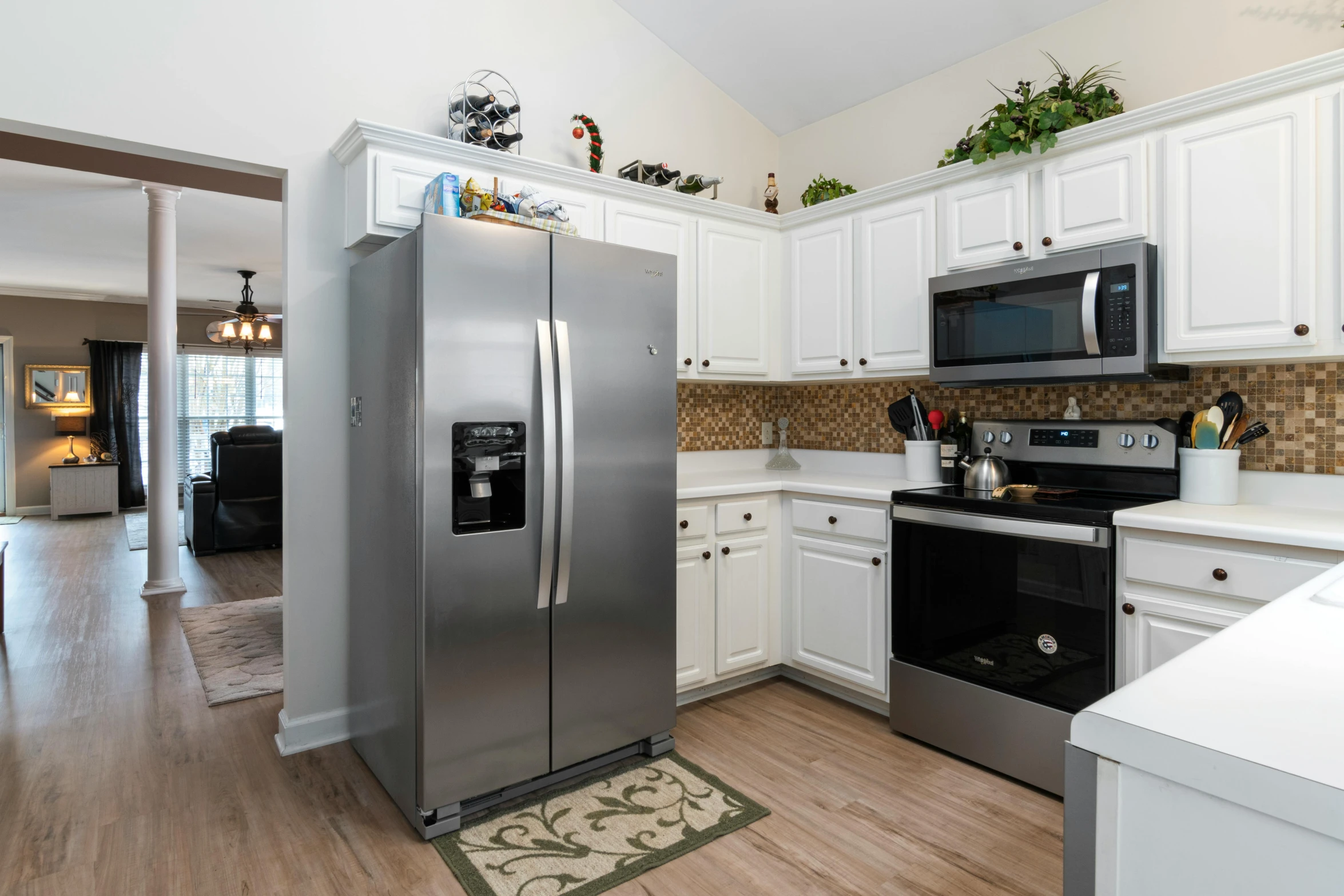 a new stainless steel refrigerator with some appliances