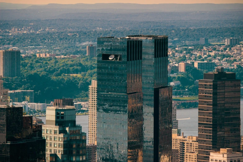 large buildings with a city below it