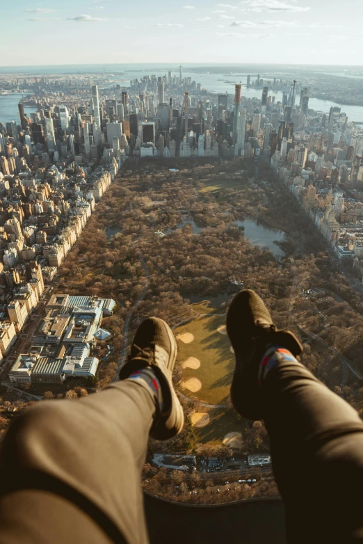 the man is watching soing in front of him from above