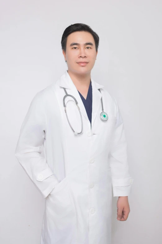 a man in white lab coat, standing