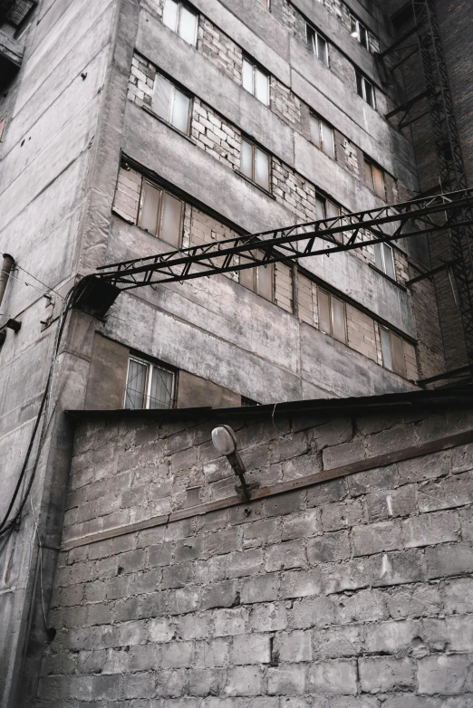 an apartment building with wires running from the top