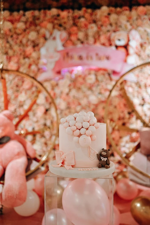 a very pretty cake in a case on a table