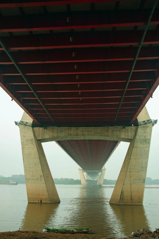 the large bridge has long poles for crossing over water