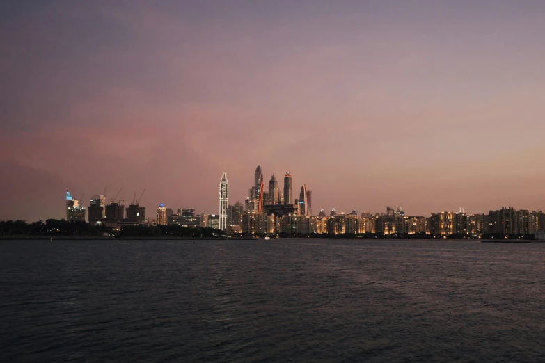 the lights on tall buildings over the water