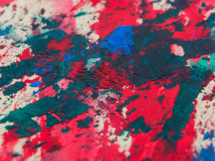 the surface of red and blue paint splattered on