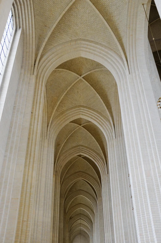 the large white pillars and roof of an architectural building