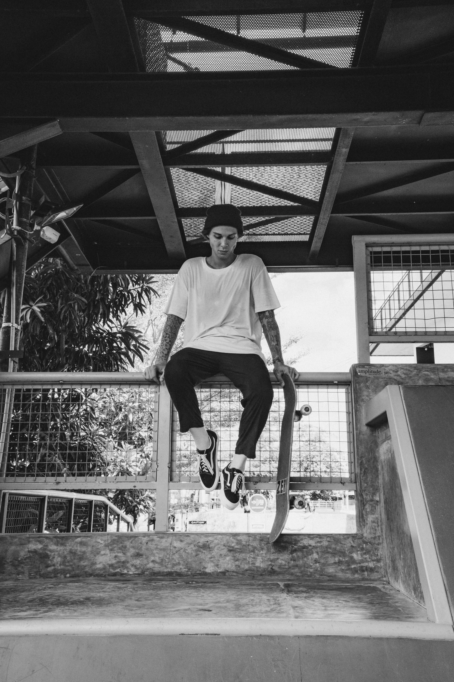 a boy on his skateboard is performing tricks