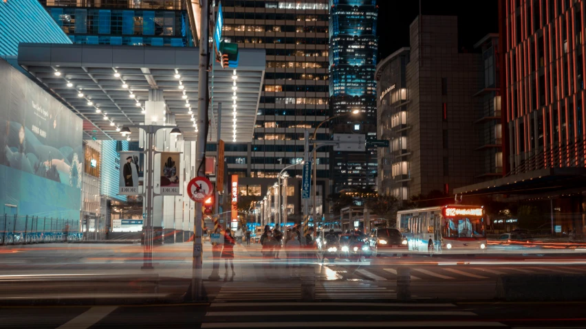 a night scene of some very big city buildings