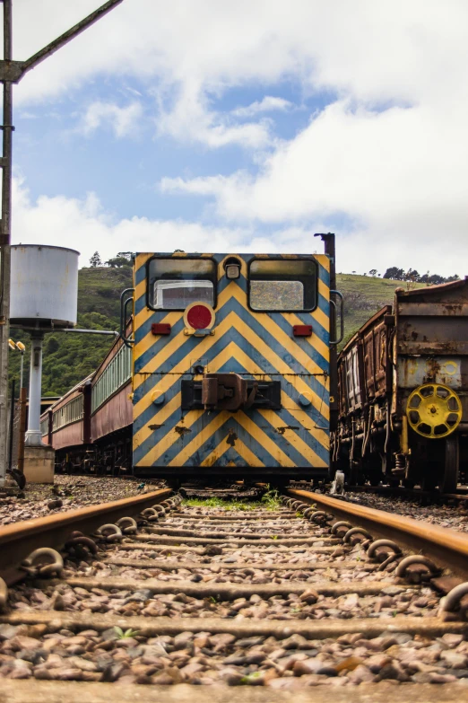 an image of train cars that are on tracks