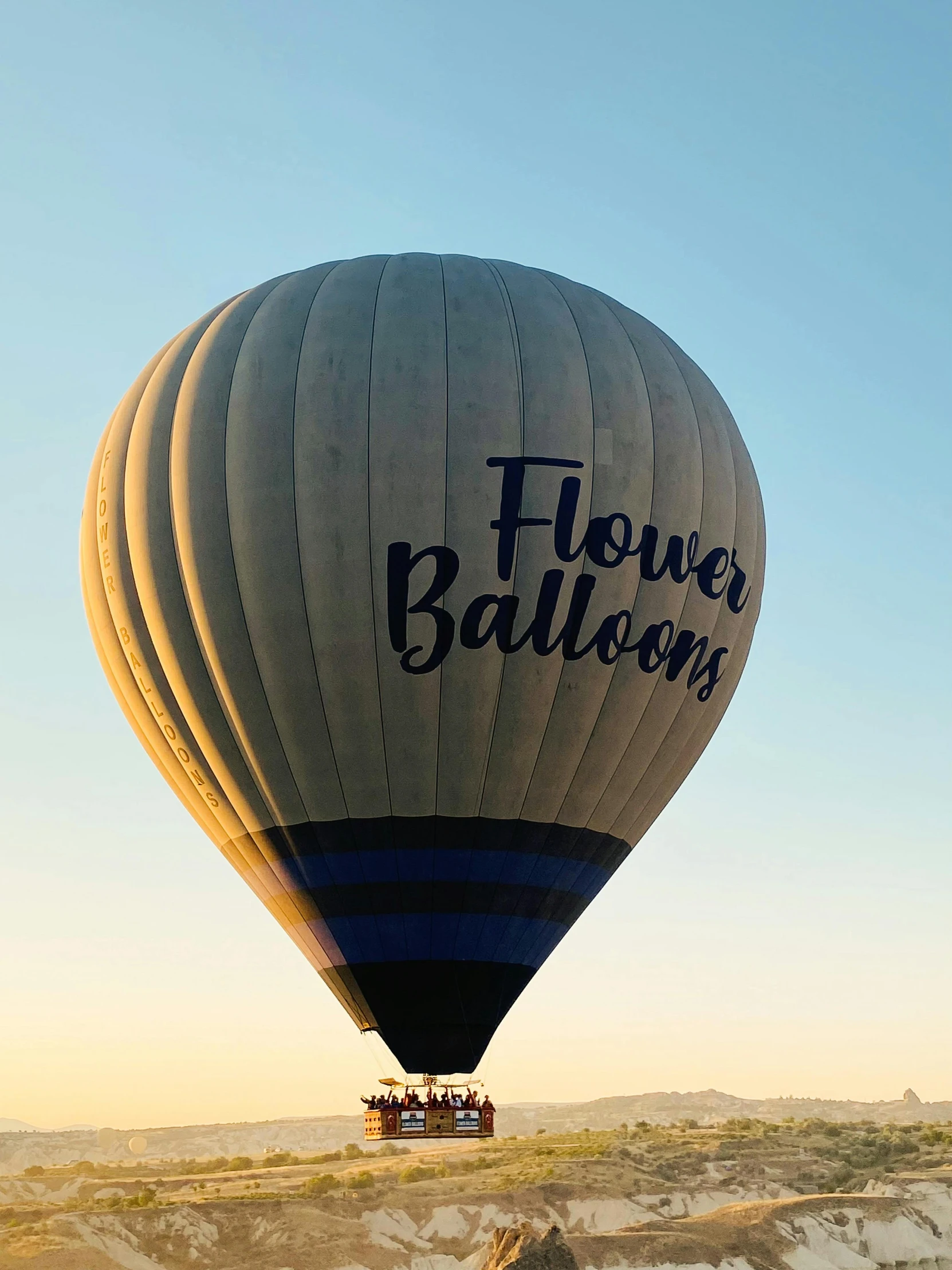 the large balloon is sitting on the ground