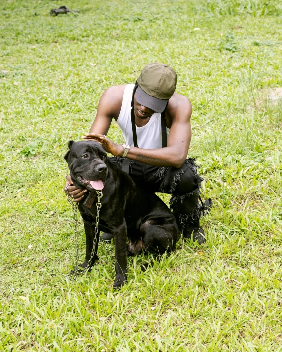 a man holding a dog in his hands