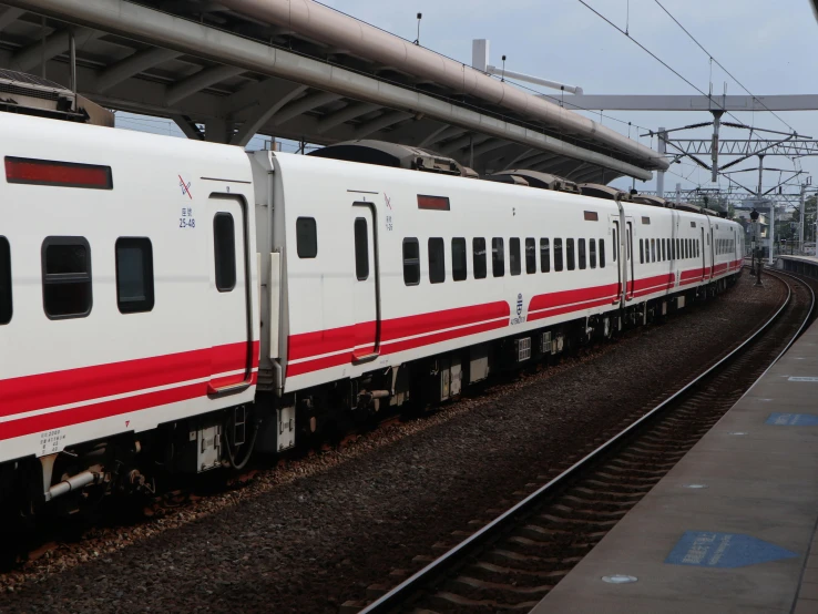 a train sits at a train station platform