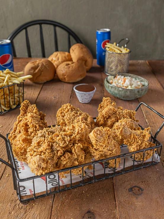 chicken sticks sitting on top of a plate next to a basket