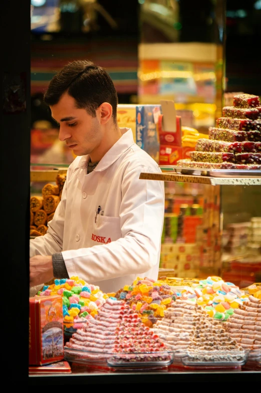 a cook preparing food in a large restaurant