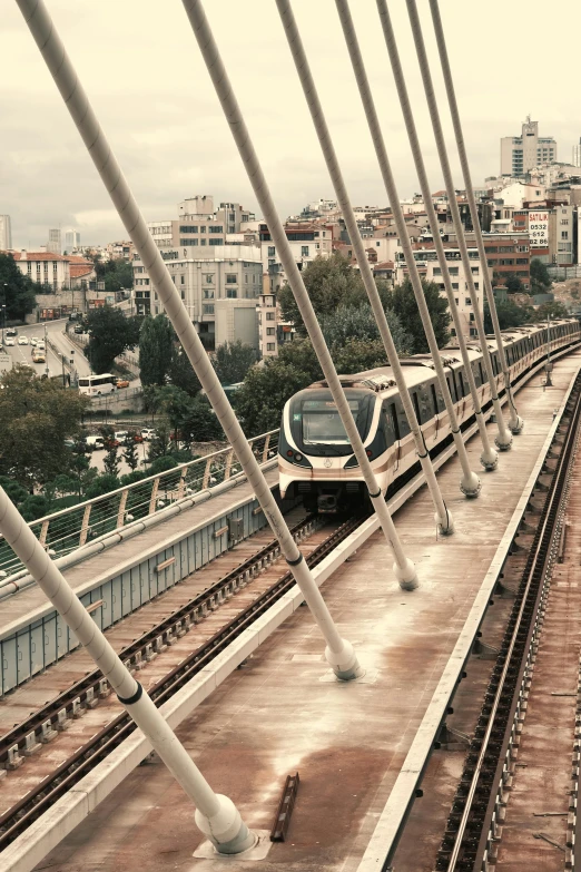 a train is on the tracks on an overpass