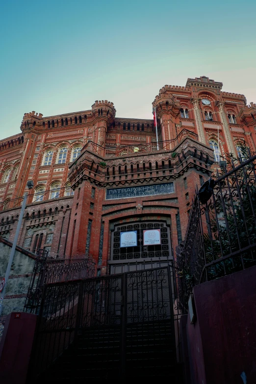 an old brick building that looks like a castle