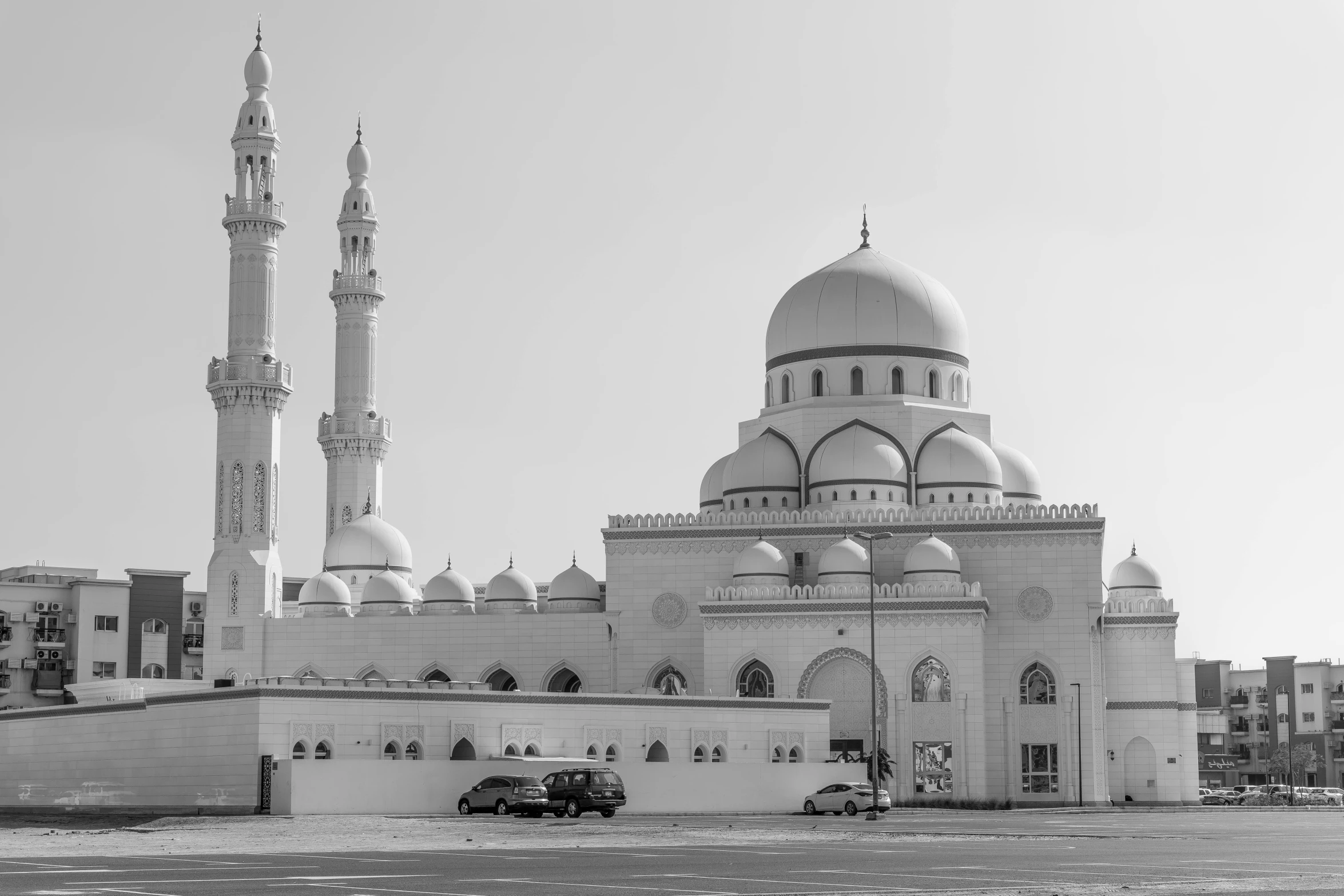 the large white building has an intricate architecture