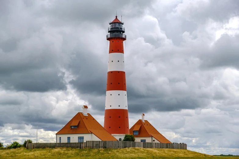 a light house on top of a hill